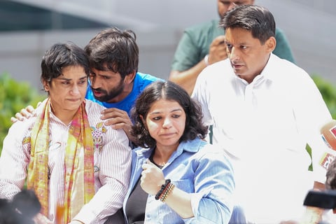 Wrestler Vinesh Phogat with other wrestlers Bajrang Punia and Sakshi Malik